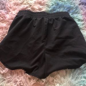 Really nice shorts that are black size 78 with underwear in the shorts.